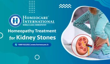 Advertisement banner for Homeocare International offering kidney stone treatment with a kidney illustration and contact URL.